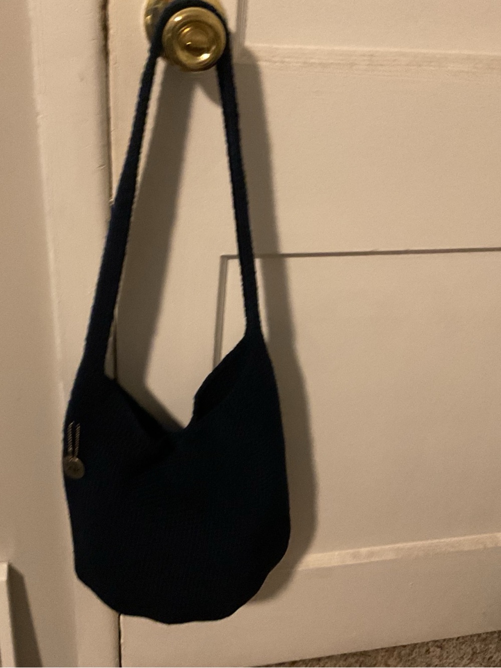 The Sak navy shoulder bag